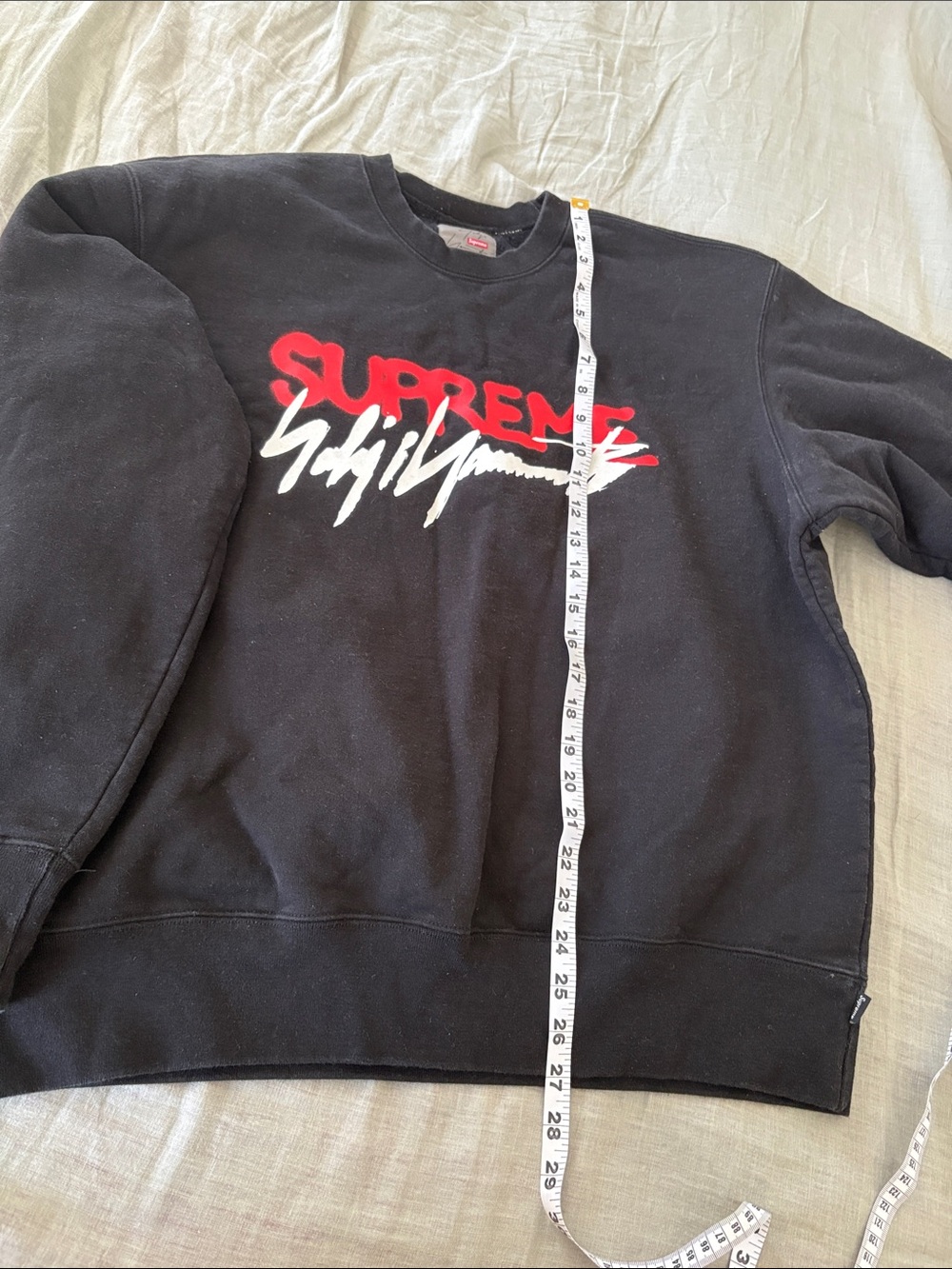 Supreme Black Crewneck with Red and White Script Graphic